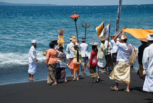 Ceremony at Lovina black volcano beach